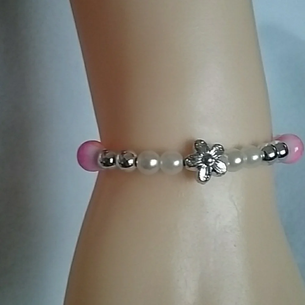 Girls floral and pink beaded bracelet